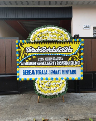 Papan Bunga Duka di Tanjakan